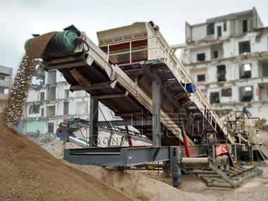 建筑垃圾怎么回收再利用?看移动破碎机在江苏的建筑垃圾处理现场